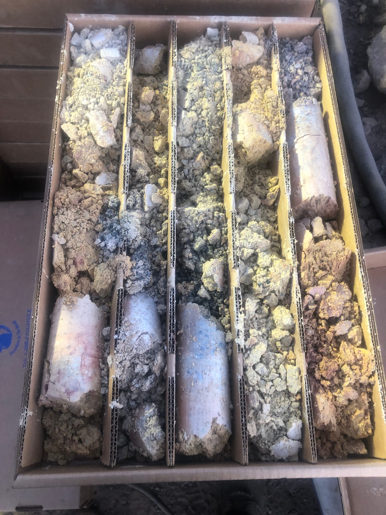 Boxed runs of sanded dolomite core laid out for review